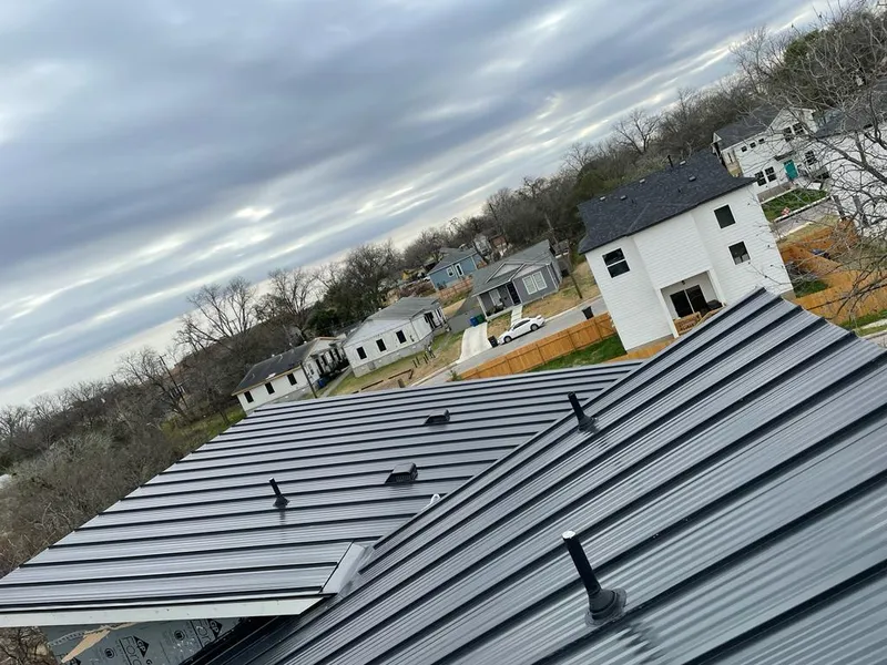Standing seam metal roof panels with vents for Skylight Repair in Ruston